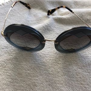 Miu miu sunglasses.